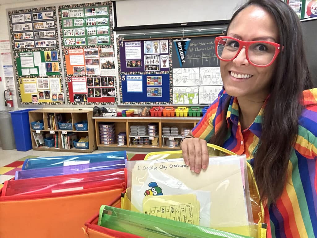 paula liz with curriculum folders