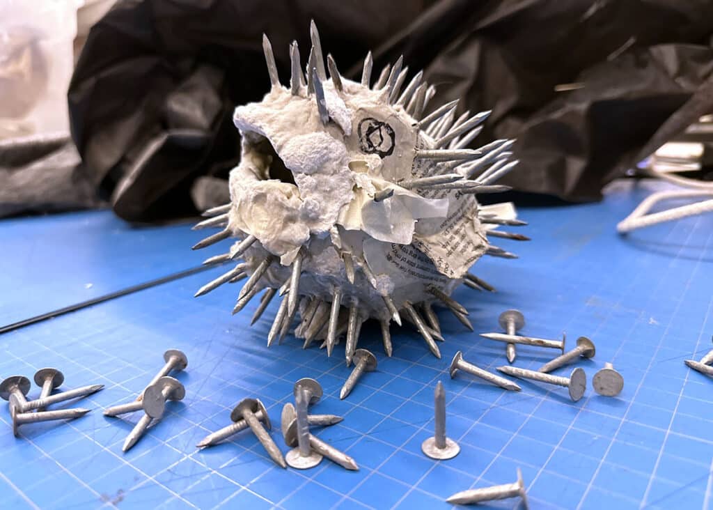 sculpture with nails