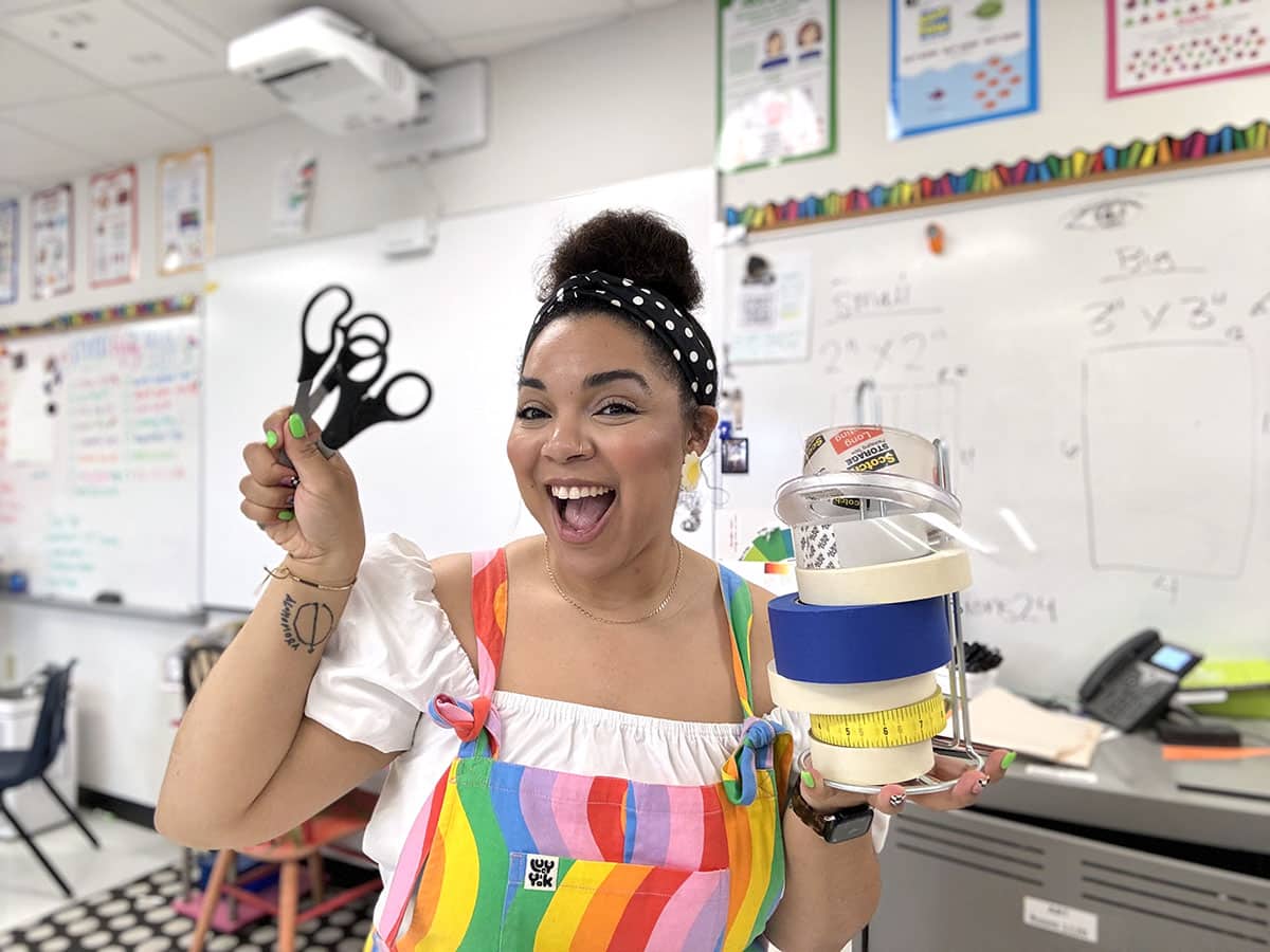 art teacher in rainbow outfit