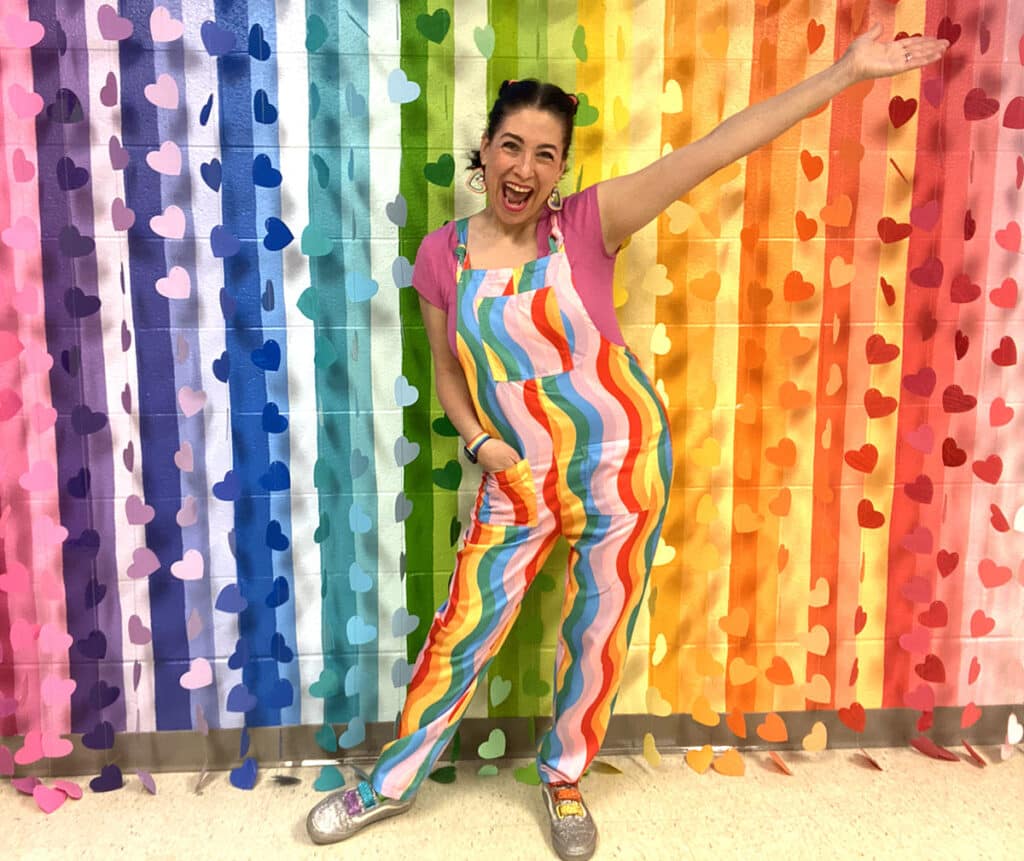 art teacher in colorful outfit
