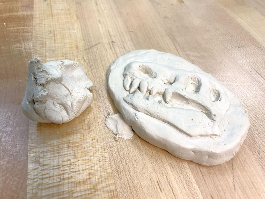 air-dry clay relief artwork with scrap clay