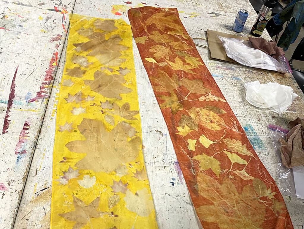 long rolls of fabric with naturally dyed patterns