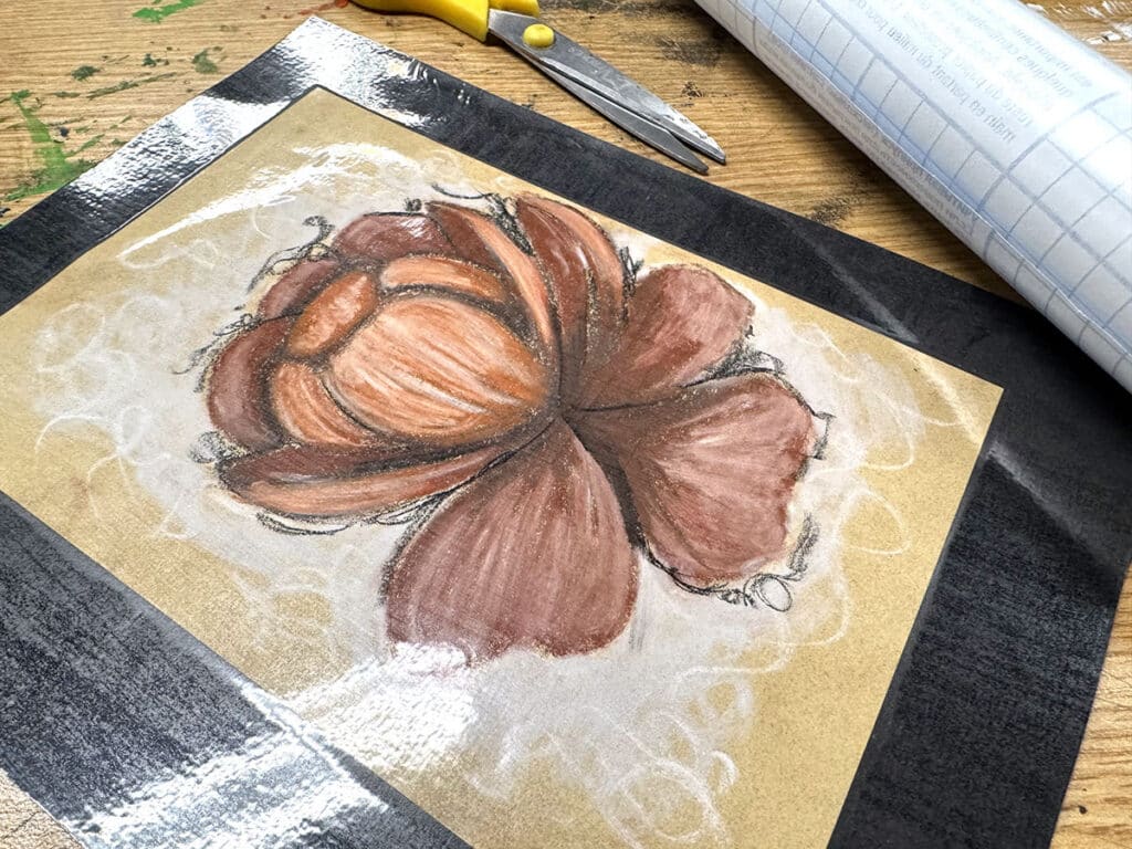 pastel drawing mounted on black paper and laminated with contact paper