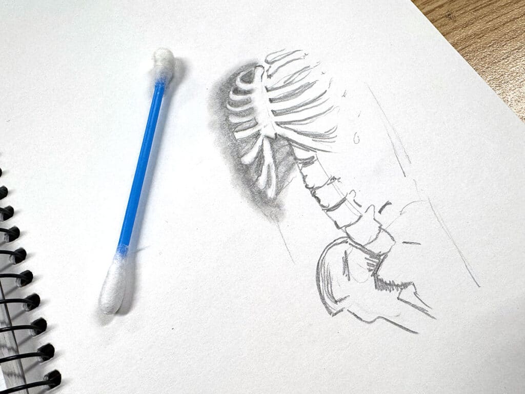 q tip with graphite drawing skeleton