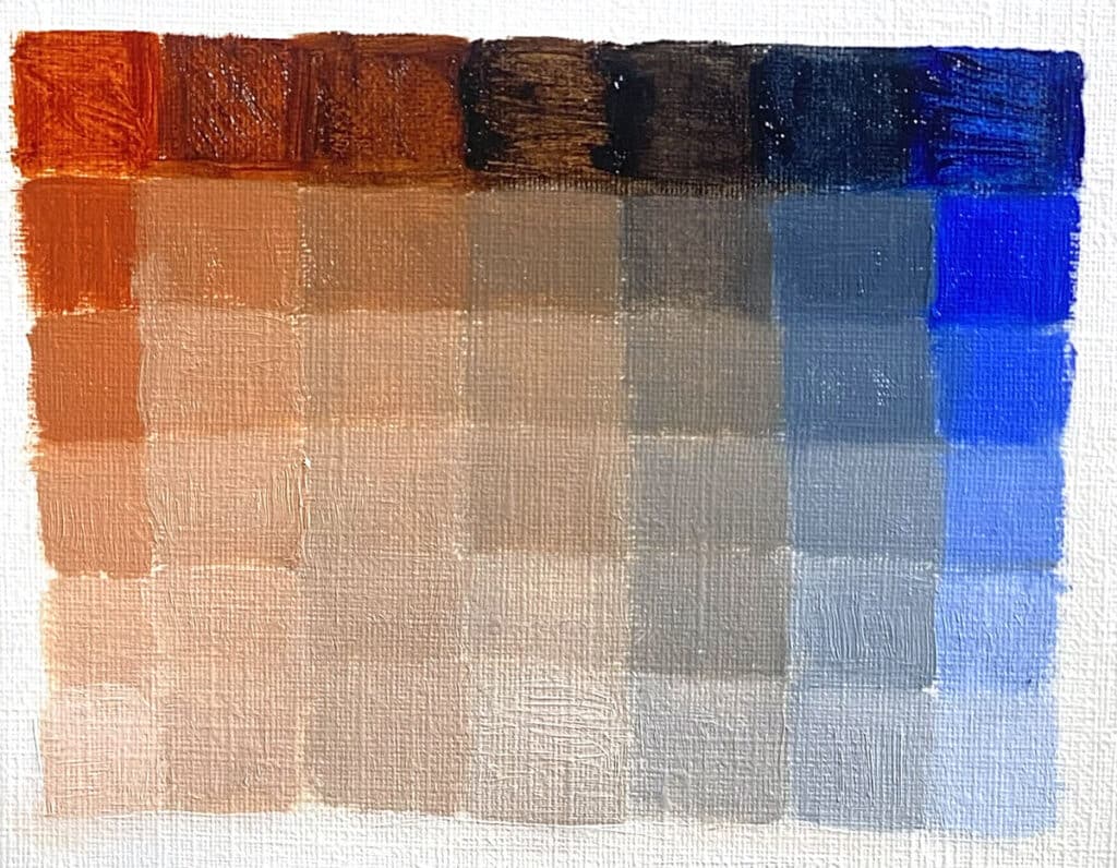 color mixing grid with orange and blue complementary colors