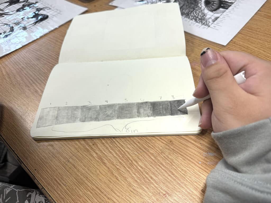 student blending a value scale