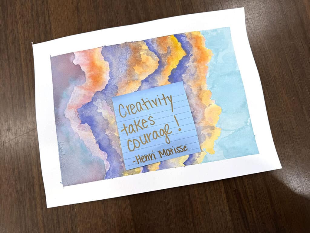 creativity takes courage sticky note on watercolor painting