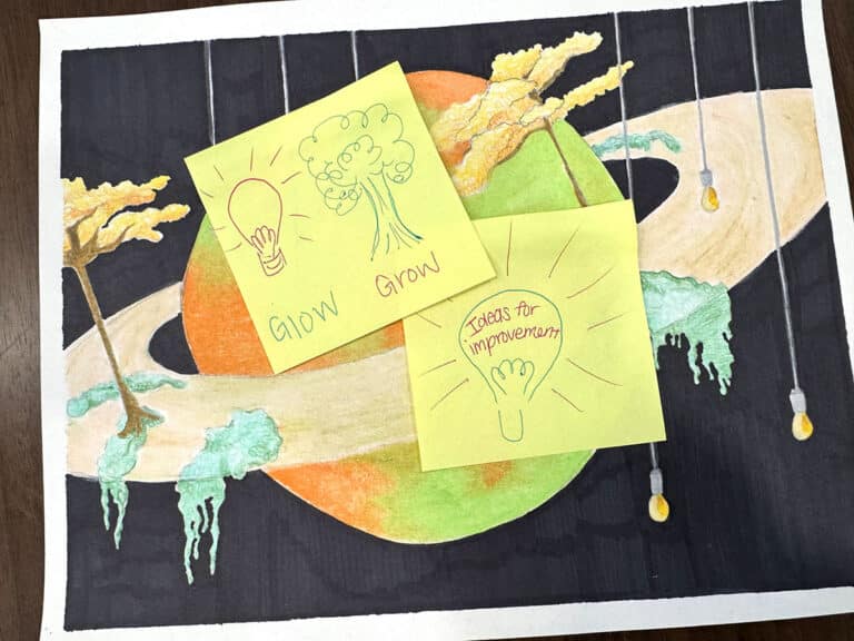 glow and grow sticky note on planet painting