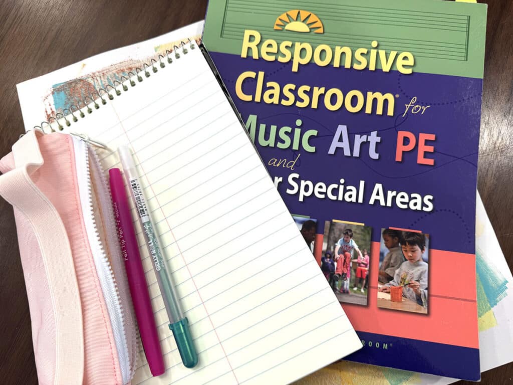 responsive classroom book with notepad, pens, and pencil case
