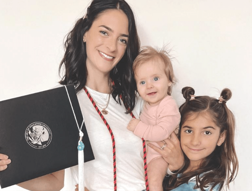 grad student with degree and two kids