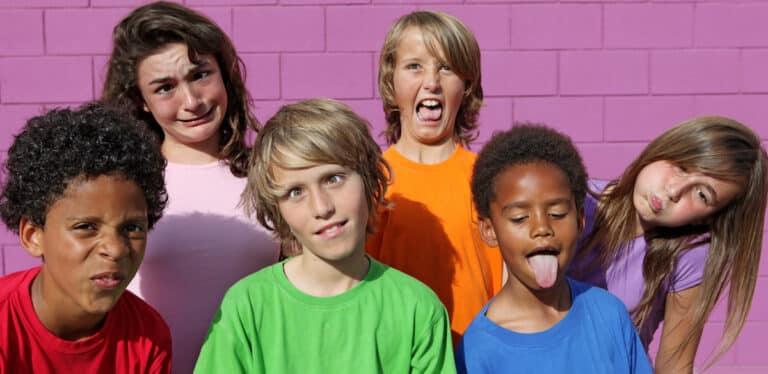 six children with goofy faces