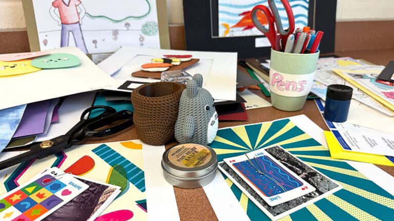 messy art teacher desk showing burnout