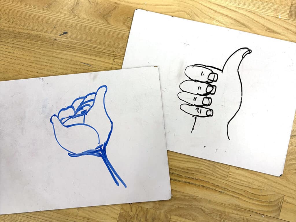 whiteboards with drawings