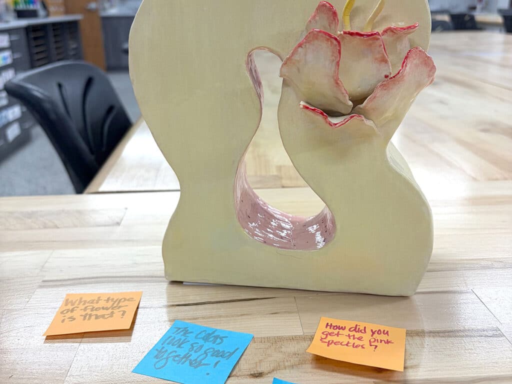 ceramic sculpture with sticky note feedback