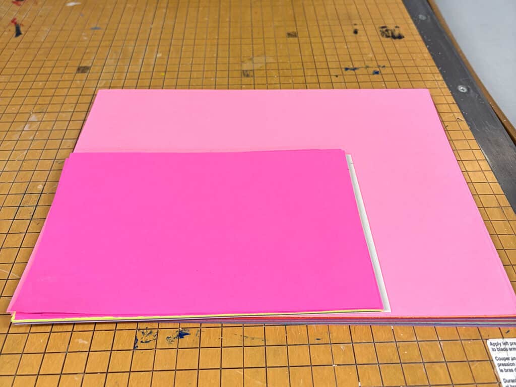 colored paper on the paper cutter