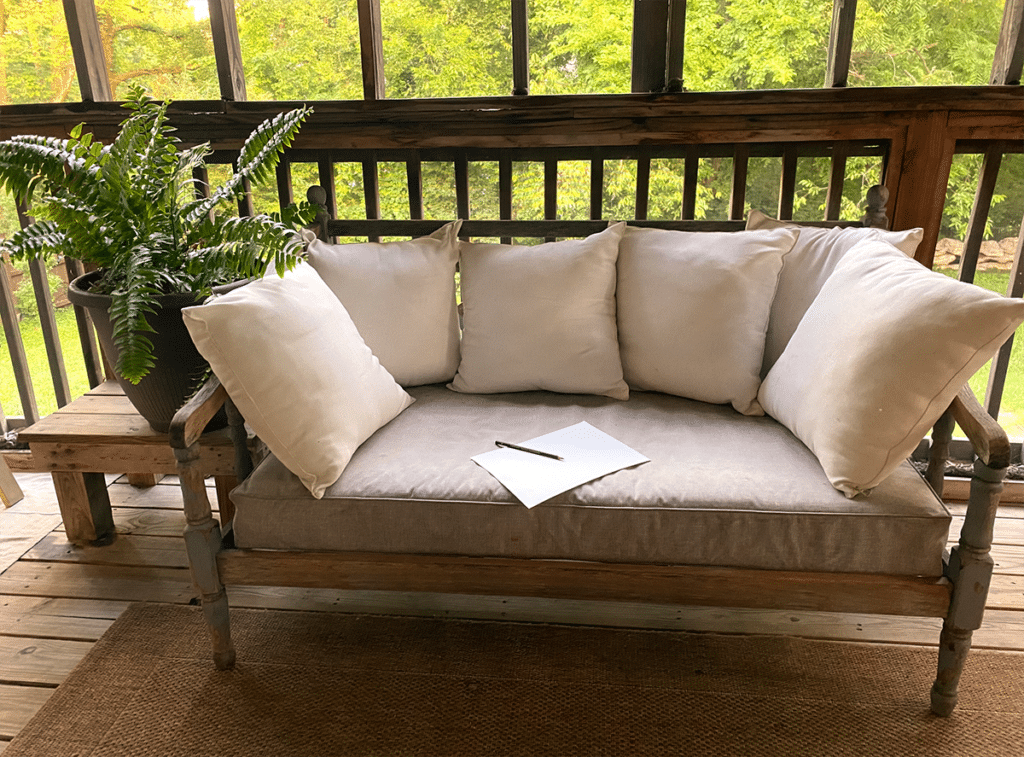 porch with seating and drawing supplies