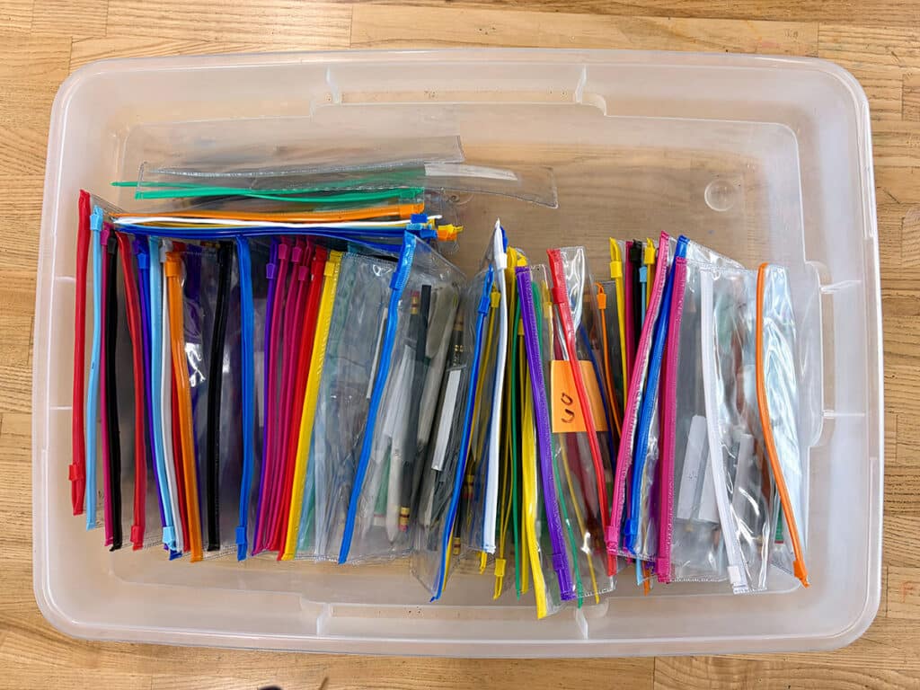 zippered pouches in a bin