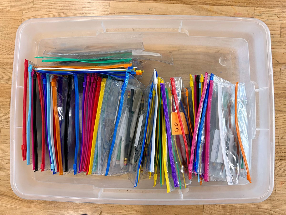 zippered pouches in a bin