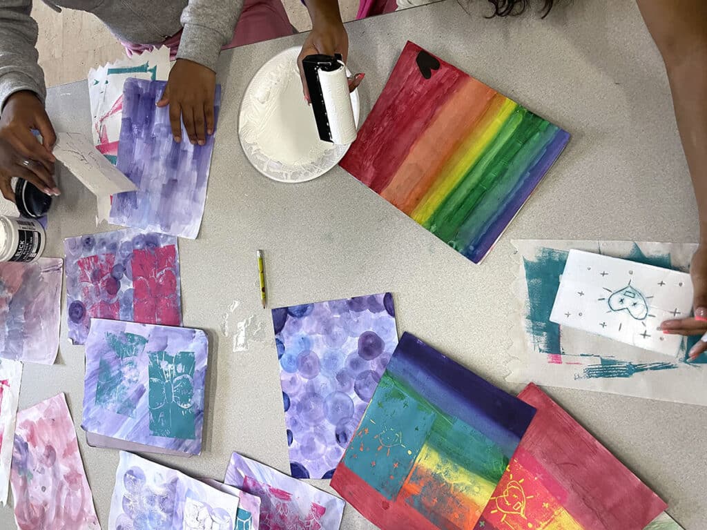 students rolling styrofoam prints